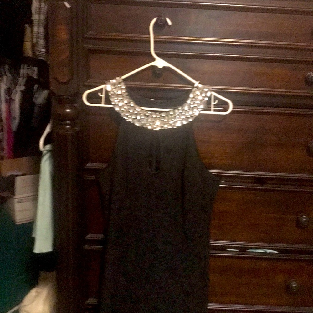 Beautiful. Elegant,dress with tasteful keyhole